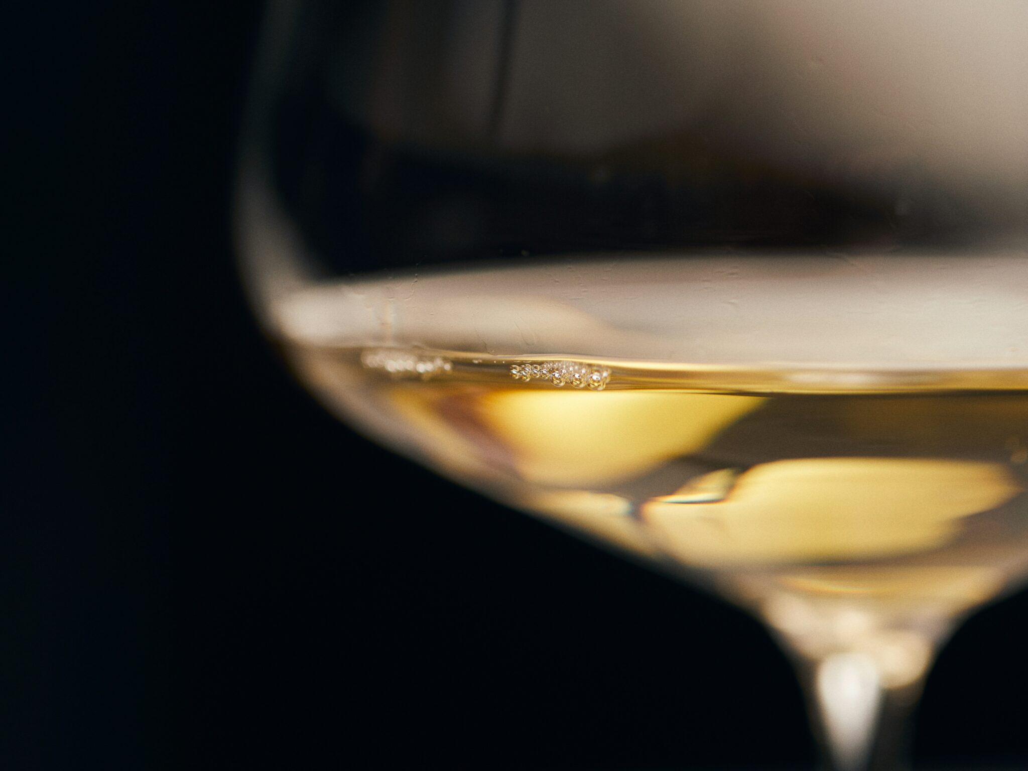 a cup with white wine